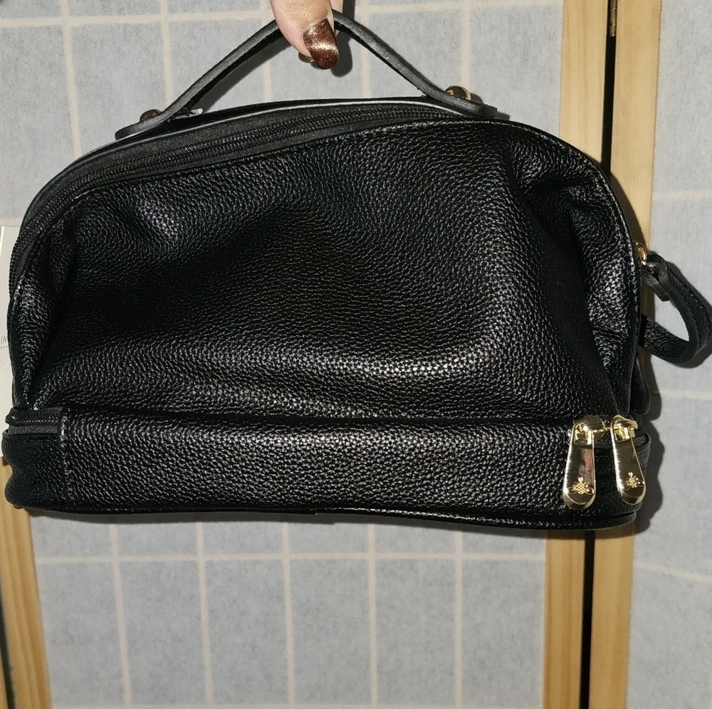 Vegan leather zip up travel bag